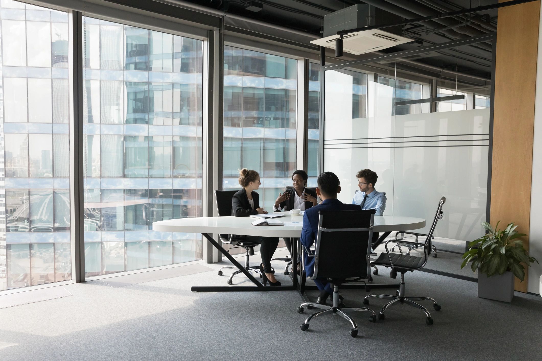 Professional team discussing strategy in a meeting room