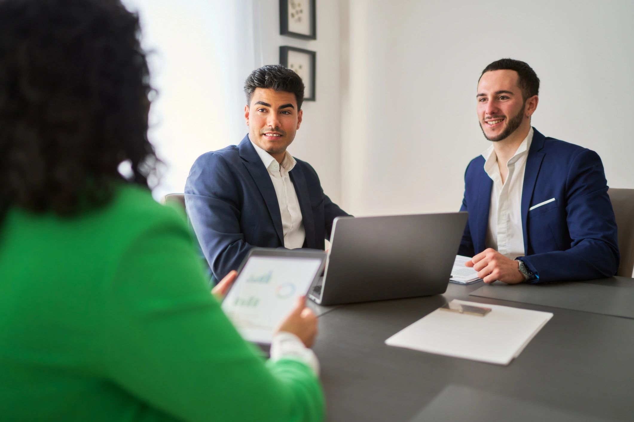 Professional team discussing legal marketing performance